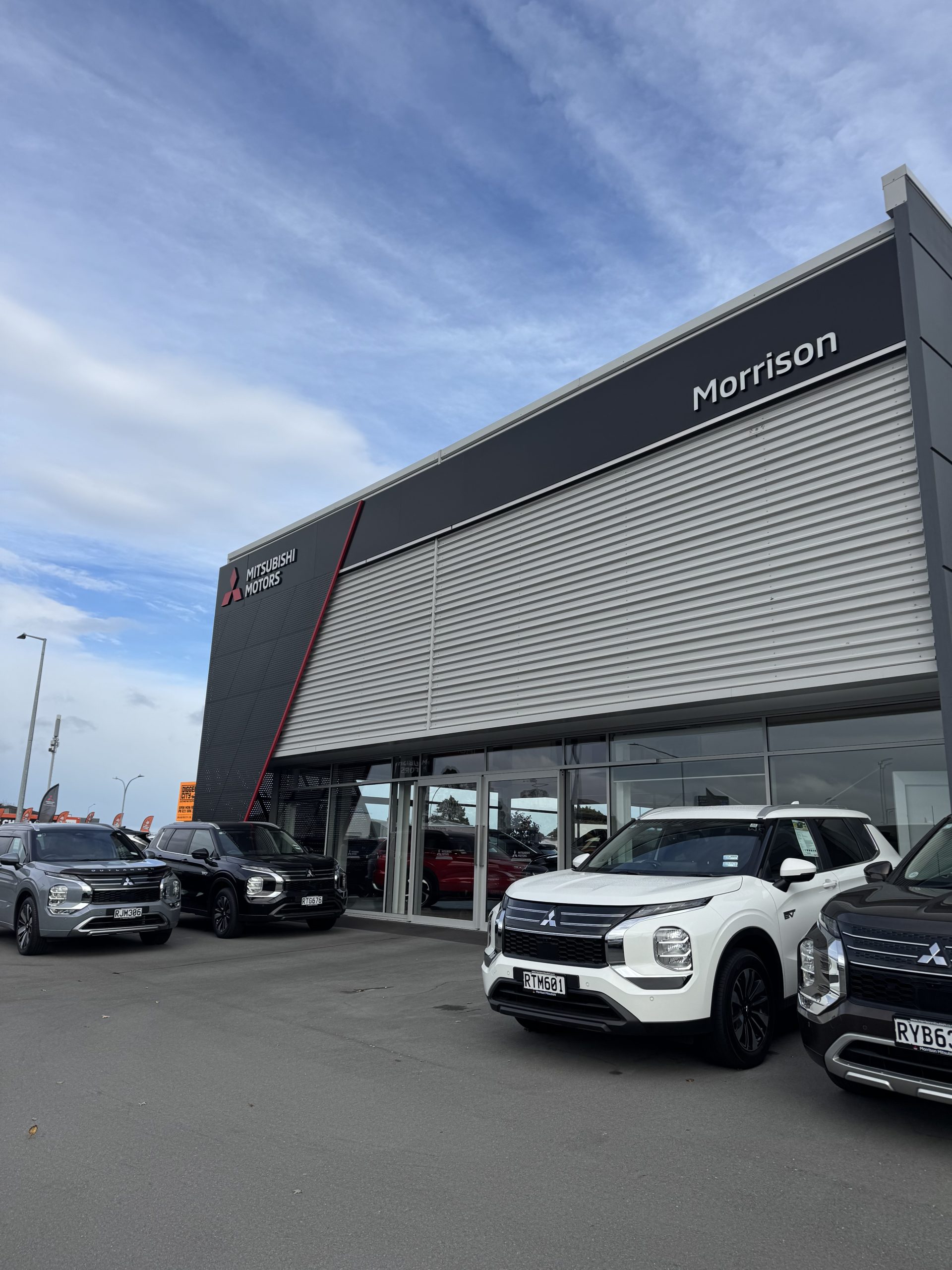 Should I buy a new or used car in Christchurch?