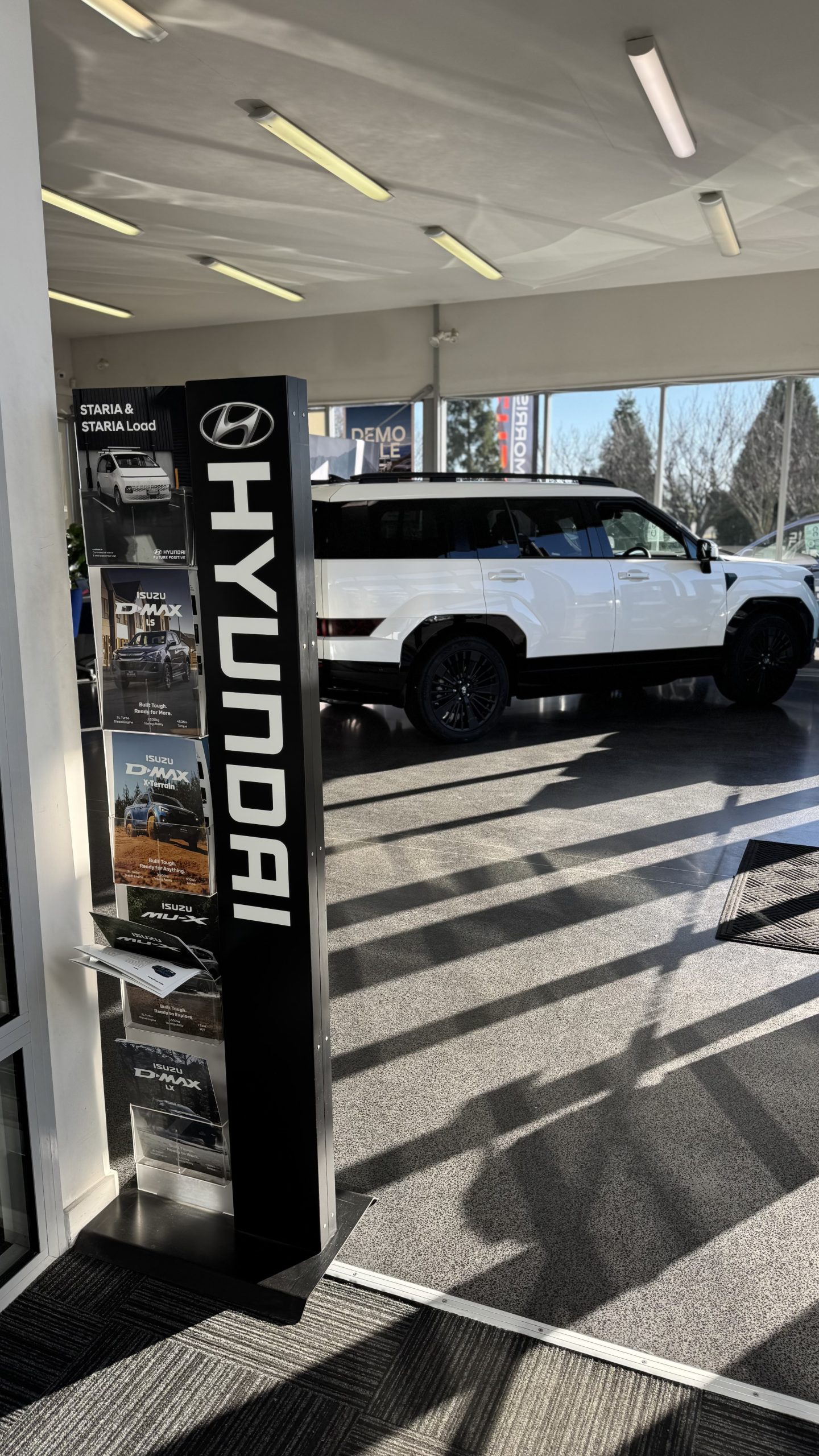 Should I buy a new or used car in Christchurch?